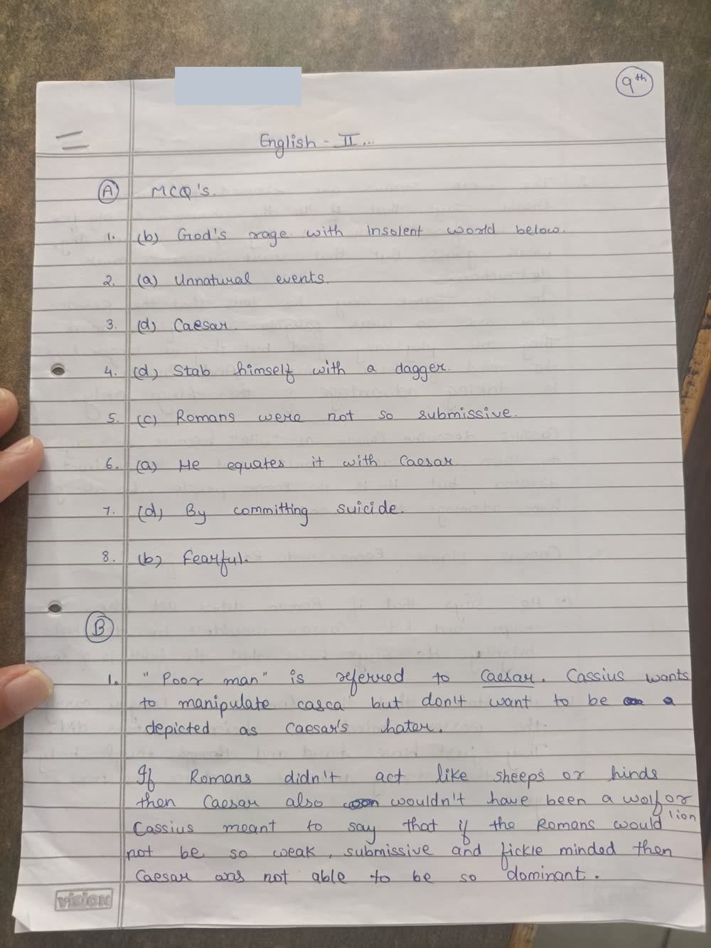 Page 1 of the handwritten answer sheet, photographed on a phone