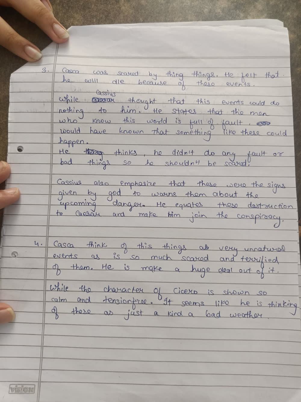 Page 5 of the handwritten answer sheet, photographed on a phone